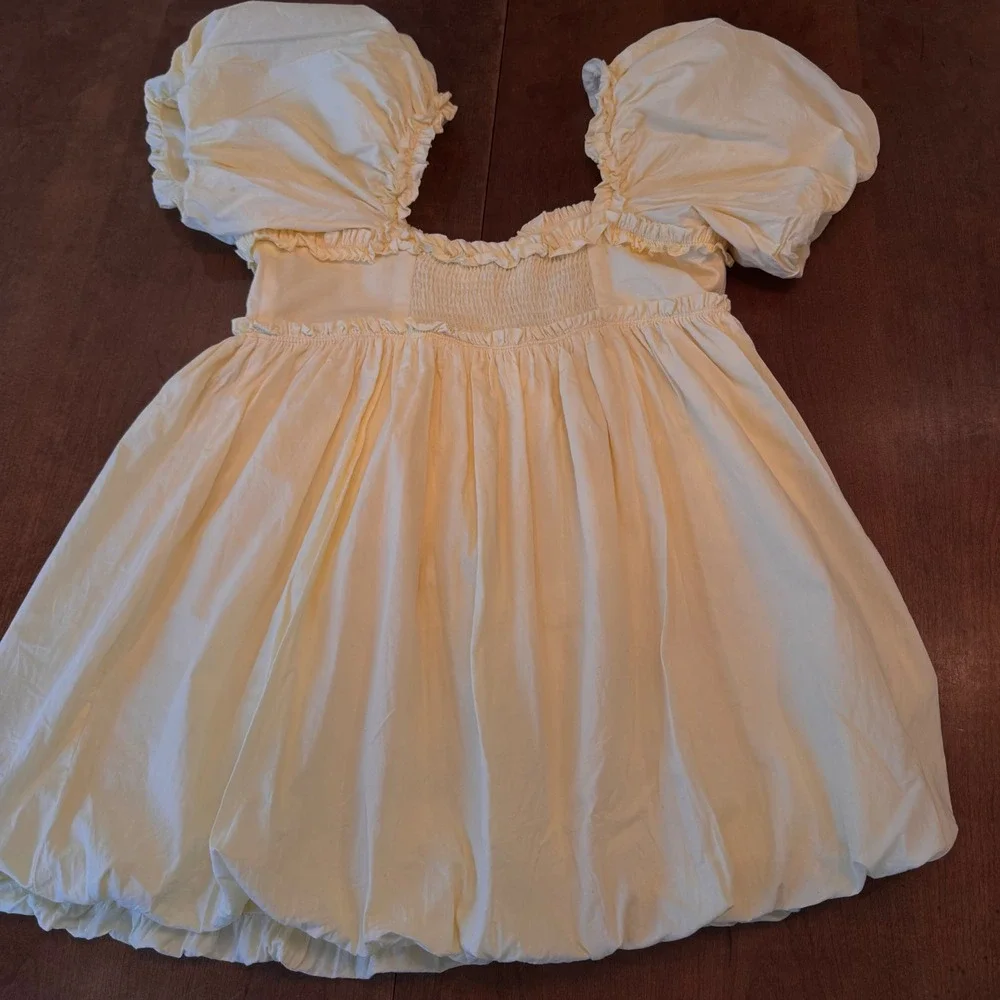 Free People Top Womens M Yellow Bubble Hem Babydoll Puff Sleeve Ruffle Smocked